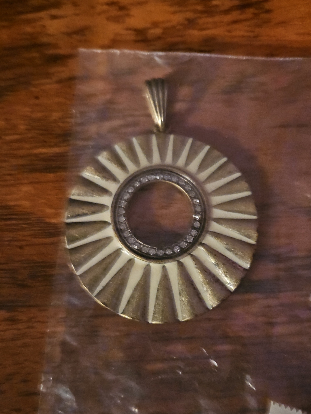 Gold-Tone Sunburst Pendant Necklace with Cream Enamel and Crystal Halo
